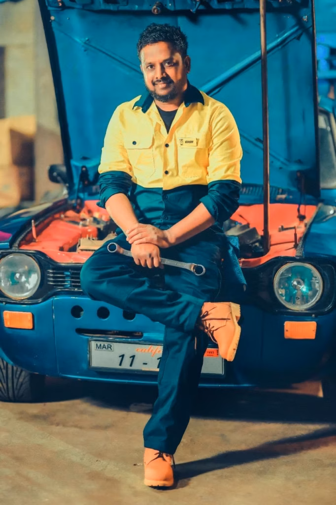 Mechanic servicing a car — photo 1