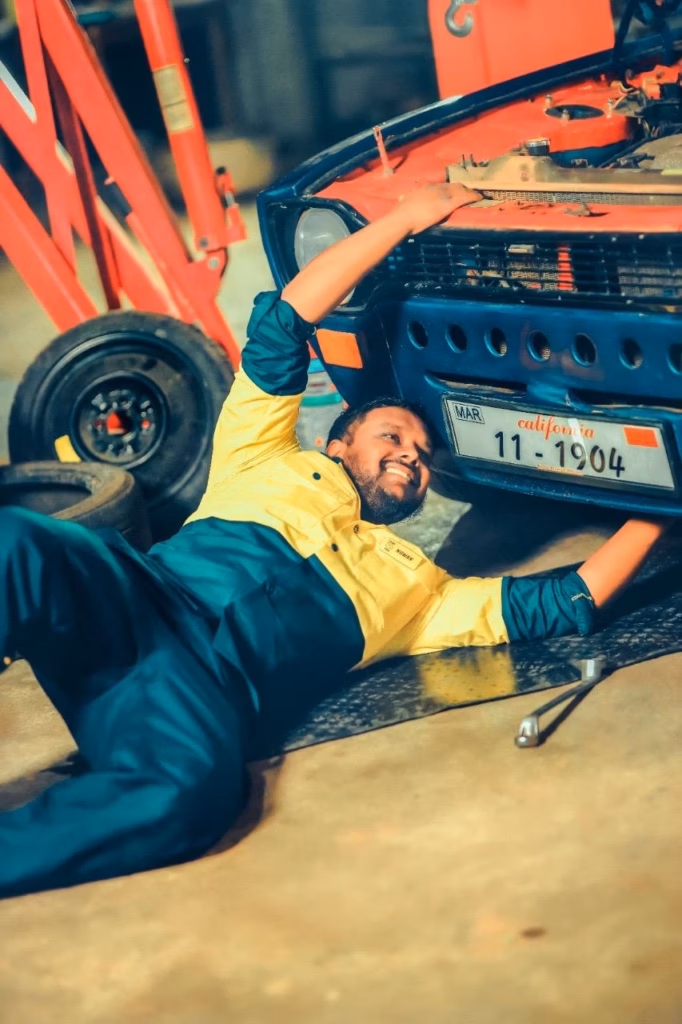 Mechanic servicing a car — photo 2
